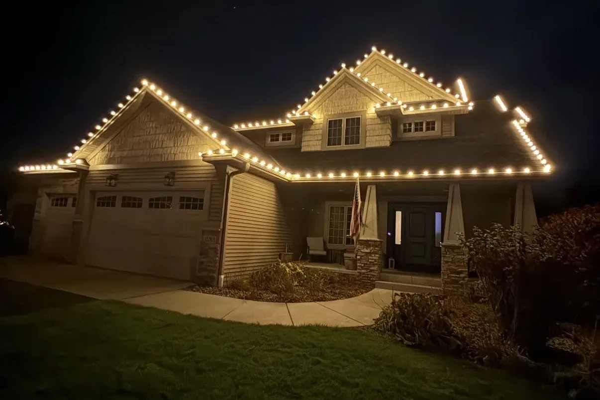 A home with Royal Christmas Lights installed along the roofline